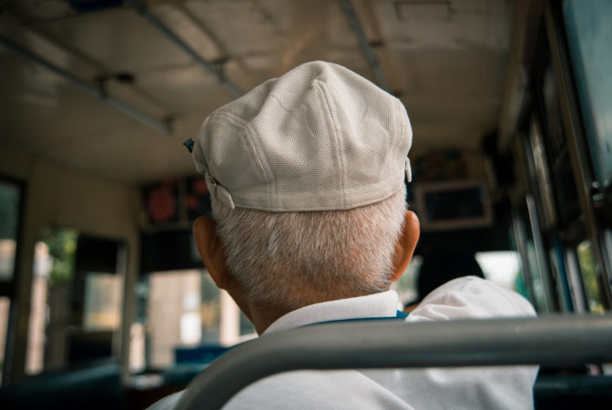 old man on bus